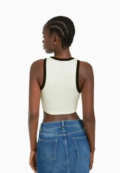 BERSHKA Sleeveless Michel Basquiat Cropped - Print - Débardeur - White -Defacto Boutique 24d266aa9ea249b89088f22c9f4dc8c1